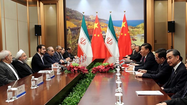 Irans President Hassan Rouhani has conferred with his Chinese counterpart Xi Jinping on a multilateral nuclear agreement Tehran signed with the P5+1 group of countries in 2015 and mutual relations, particularly in economic and trade sectors.