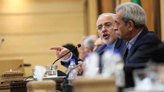 Addressing a meeting of Iran’s Chamber of Commerce in Tehran on Sunday, Zarif commented on the future of Iran’s economy under mounting pressures from the enemies.
