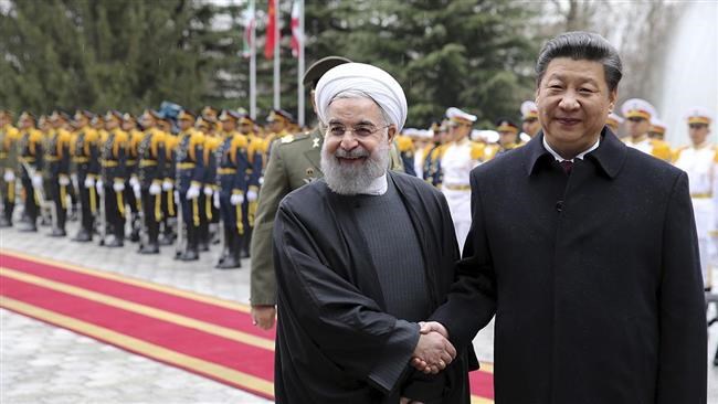 China, Iran’s top oil customer, says commercial cooperation between the two sides does not harm other countries interests and thus should be protected from unilateral US sanctions.