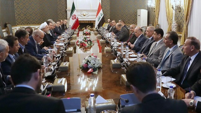 Iran and Iraq vowed on Monday to take further steps to develop their bilateral ties as the two neighbors eye closer regional cooperation in the wake of rising tensions in the region.