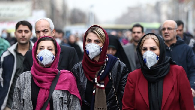 Iranian factories producing face masks have swung into full gear amid a surge in coornavirus cases in the country that has caused deaths for a dozen people and infected scores more.