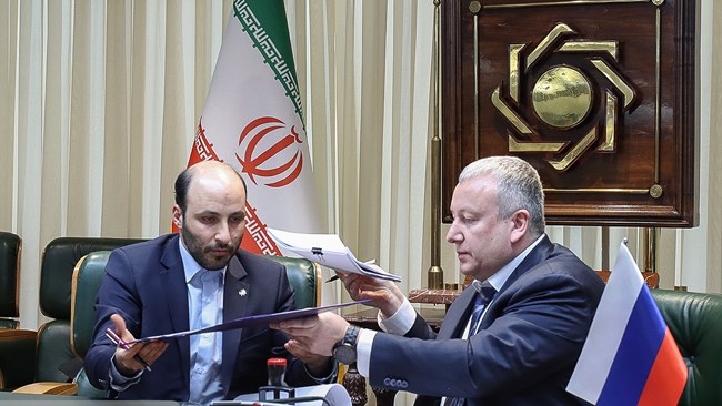 The central banks of Iran and Russia Sunday signed a deal to connect their national interbank communication and transfer systems to help boost trade and ease two-way bank transactions.