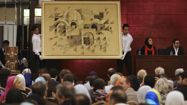 An annual art auction in Tehran drew record sales of $7.4 million Friday.