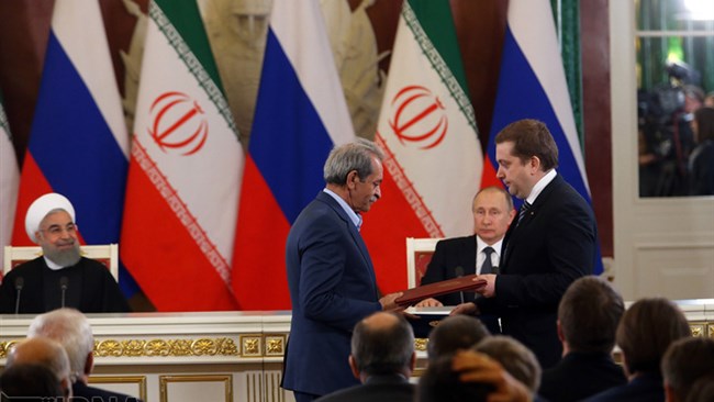 Iranian and Russian officials signed 14 memorandums of understanding (MOUs) on the sidelines of a meeting between Irans President Hassan Rouhani and his Russian counterpart Vladimir Putin in Moscow on Mar. 28.