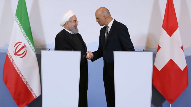 Iranian President Hassan Rouhani has lashed out at American officials for threatening to stop Irans oil exports, saying they would never be able to carry out such a threat. He further said that Iran and Switzerland resolved to continue trade ties.
