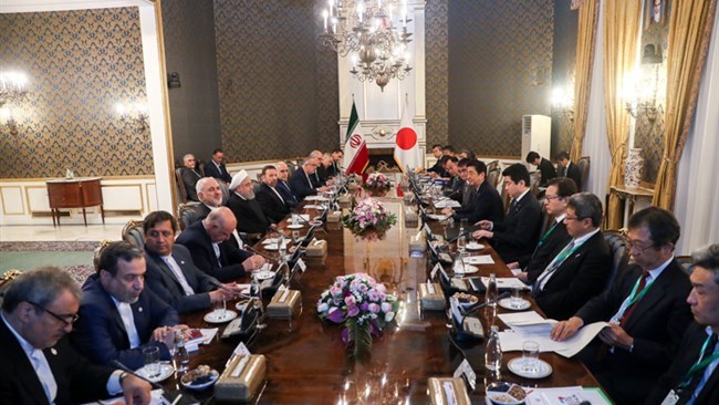 Takeshi Osuga who is the spokesman for the Japanese delegation, headed by PM Shinzo Abe, to Iran has avoided at all costs to confirm whether Iranian president and Abe talked about Iran crude sales to the country. He says it was only raised by President Rouhani as a "wishful statement".