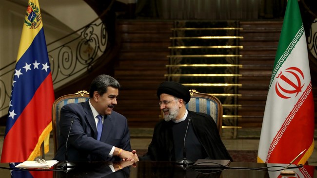 Iran and Venezuela signed a 20-year “cooperation road map” during a state visit by President Nicolas Maduro to Tehran as the two oil-rich countries reeling under US sanctions pledged to boost bilateral ties.