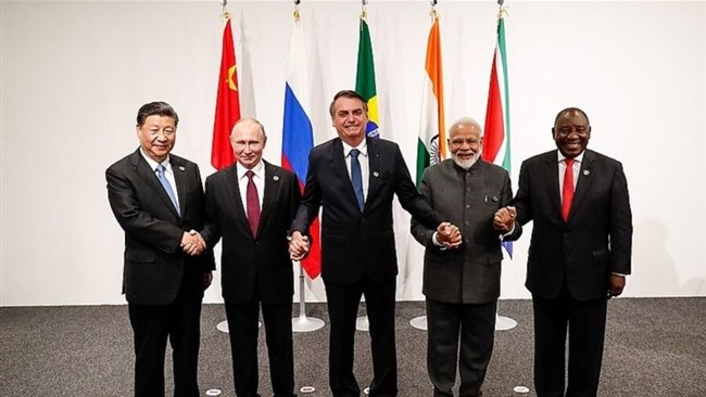 The potential launch of a gold-backed BRICS currency, which could be supported by 41 large and influential economies, would weaken the dollar-euro domination in the global economy and would benefit countries such as Iran, an Iranian diplomat has said.